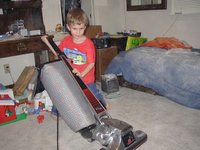2003-03-11 17-03-38-Chance-cleaning-Daxs-room-baby-powder.JPG